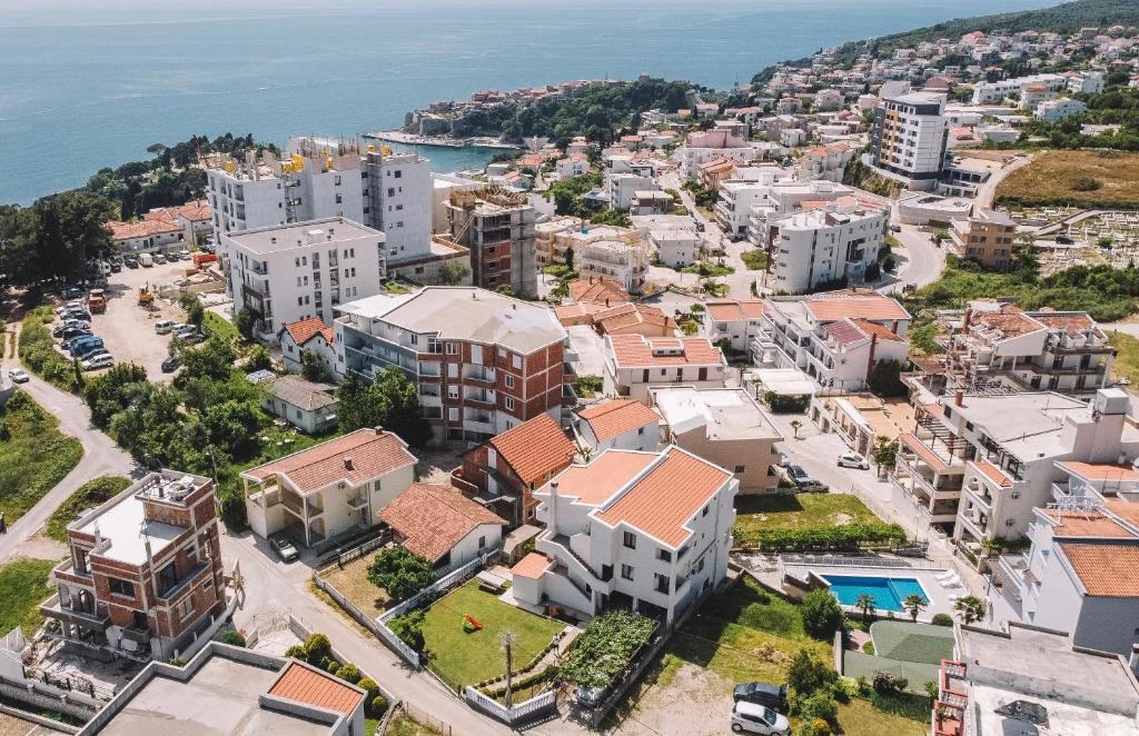 an aerial view of a city with buildings and the ocean at Apartments Radosevic in Ulcinj