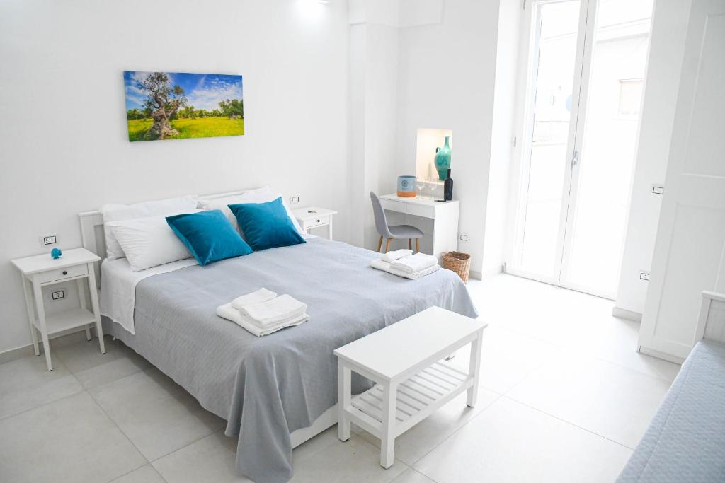 Postel nebo postele na pokoji v ubytování B&B Benefici