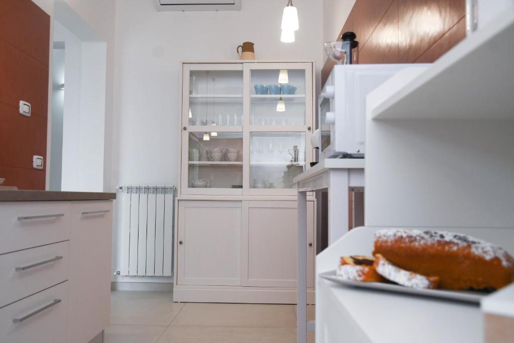 Kuchyň nebo kuchyňský kout v ubytování B&B Benefici