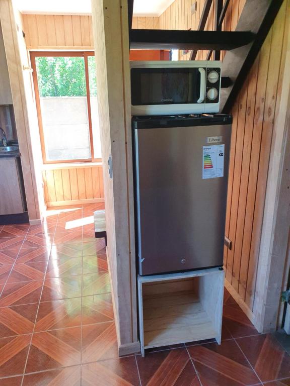 Kuchyň nebo kuchyňský kout v ubytování Cabañas Rosner