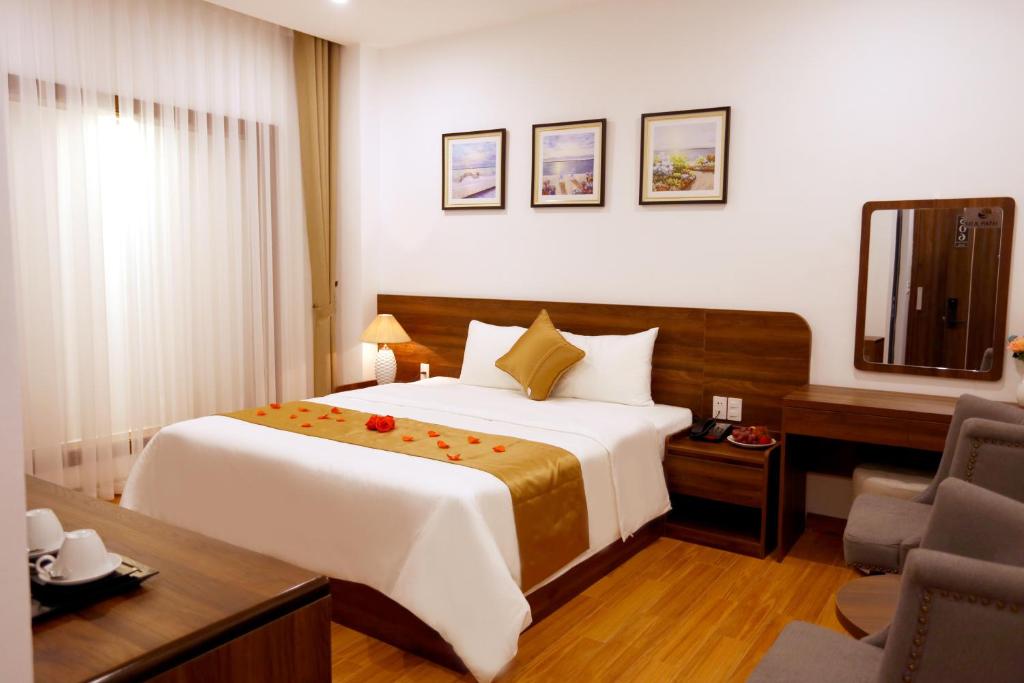 Giường trong phòng chung tại Silk River Hotel Ha Giang