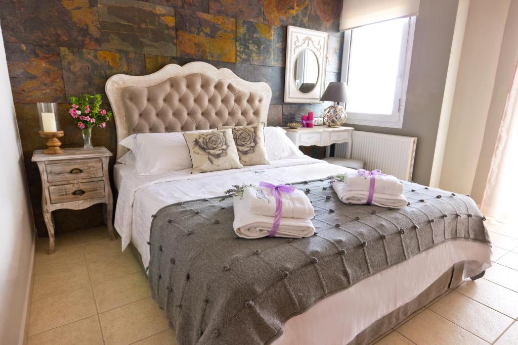 Postel nebo postele na pokoji v ubytování Villa Teresa Luxury Suites