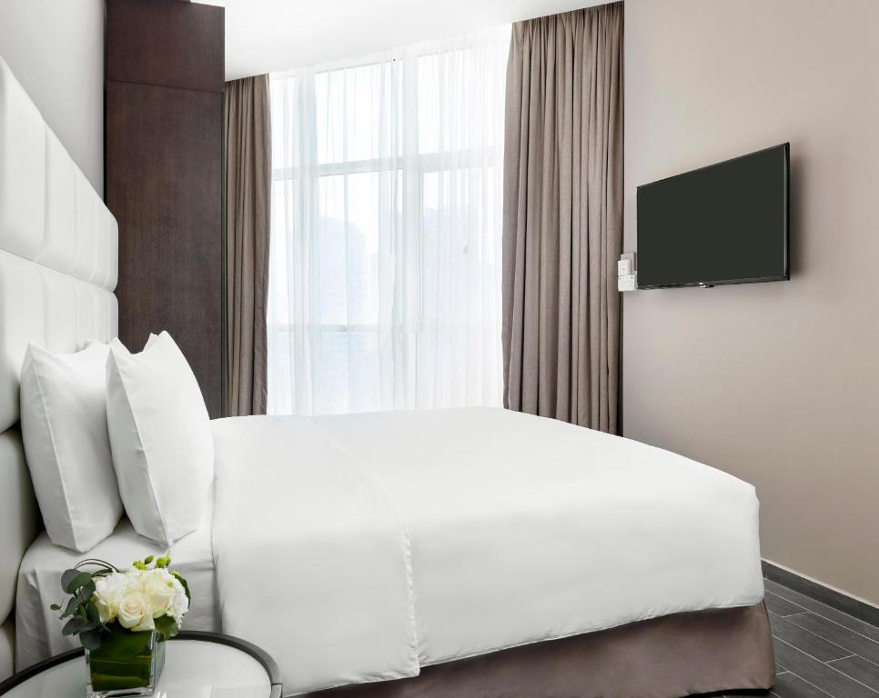 TV a/nebo společenská místnost v ubytování Staybridge Suites - Doha Lusail by IHG