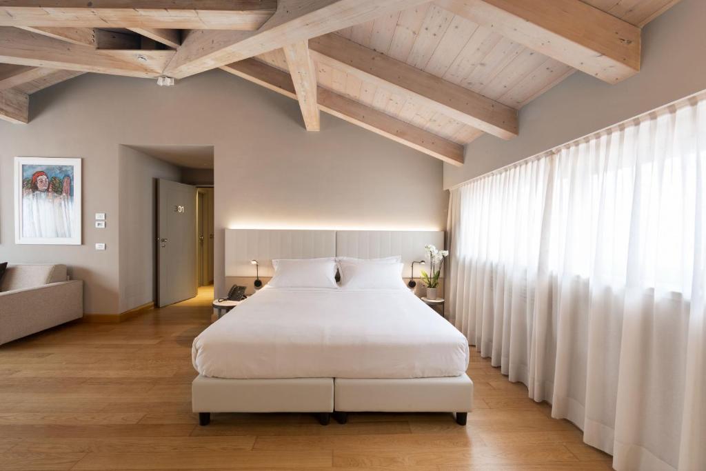 Postel nebo postele na pokoji v ubytování Grand Hotel San Gemini I UNA Esperienze