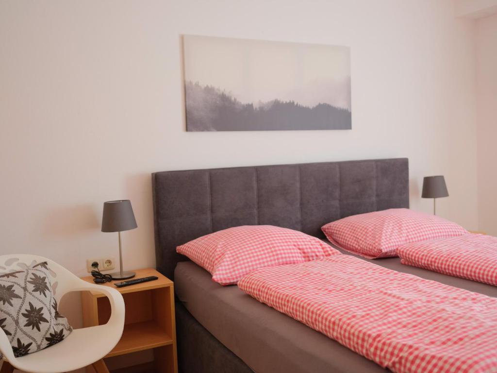 Postel nebo postele na pokoji v ubytování Waldhaus Talblick