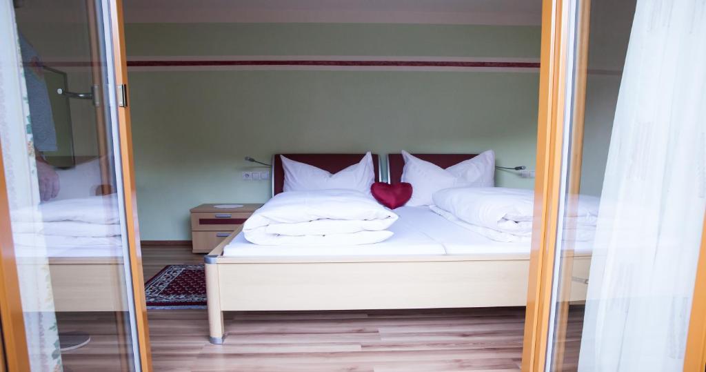 Postel nebo postele na pokoji v ubytování Apart Huditz