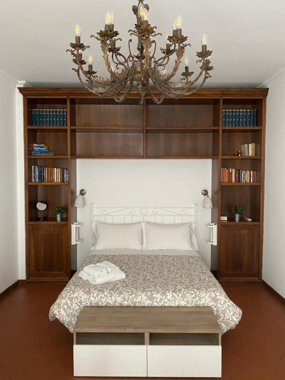 Postel nebo postele na pokoji v ubytování Al Ponte Del Papa B&B