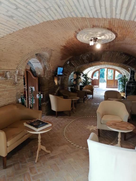 Posezení v ubytování Relais Castrum Boccea