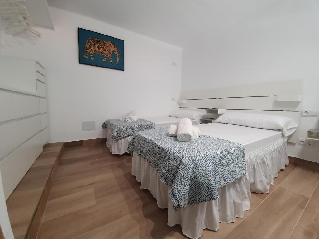 Postel nebo postele na pokoji v ubytování Ca´n RoSer