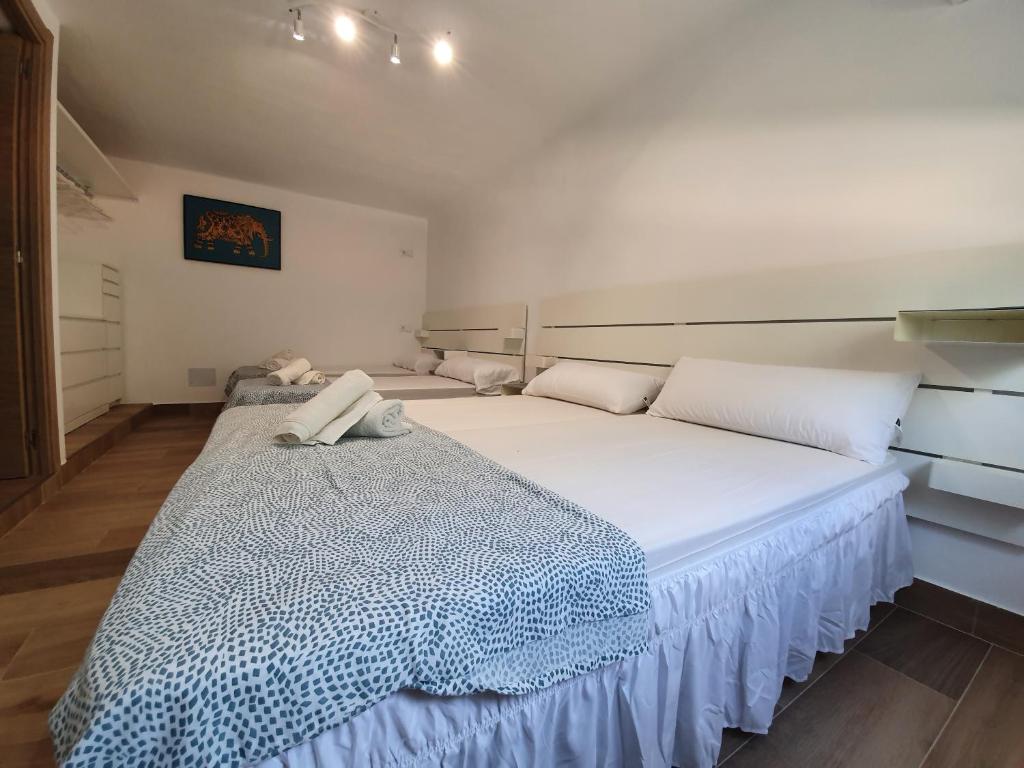 Postel nebo postele na pokoji v ubytování Ca´n RoSer