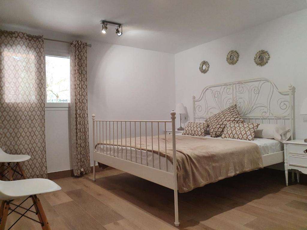 Postel nebo postele na pokoji v ubytování Ca´n RoSer