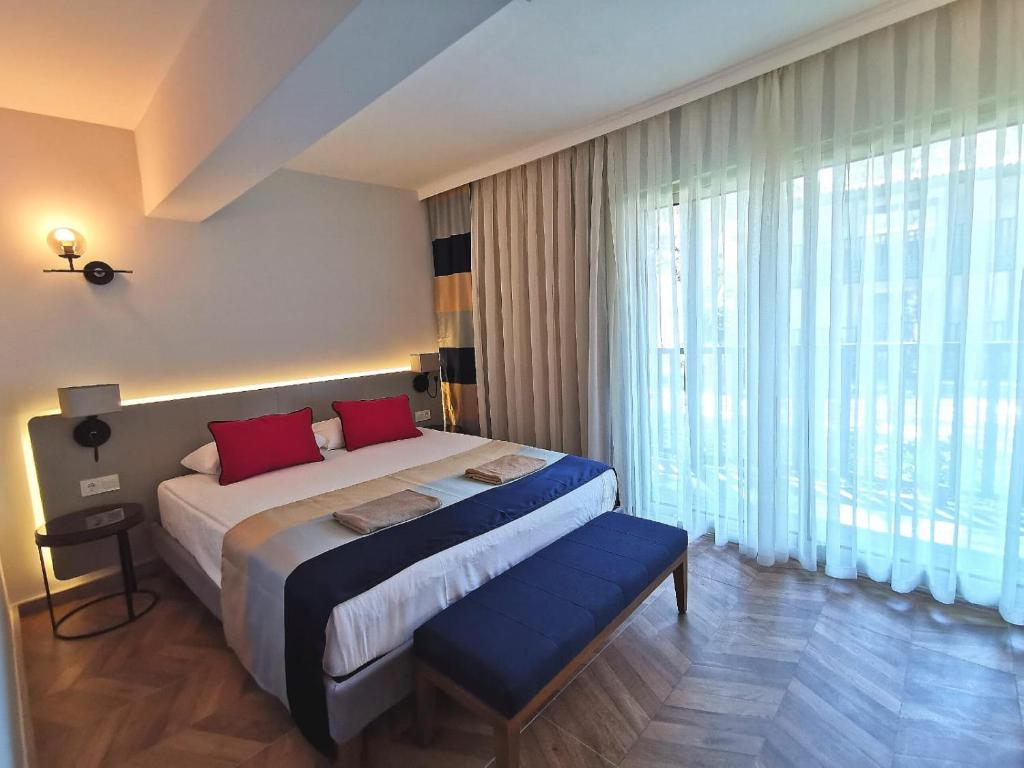 Postel nebo postele na pokoji v ubytování Crystal Flora Beach Resort - Ultimate All Inclusive