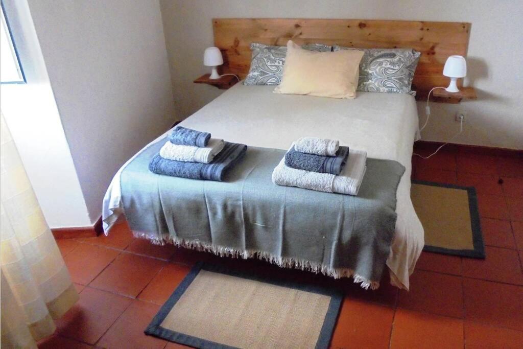 Кровать или кровати в номере Casa de S. Domingos
