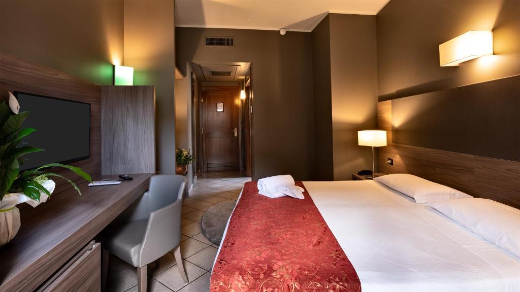 Postel nebo postele na pokoji v ubytování Hotel Sunflower