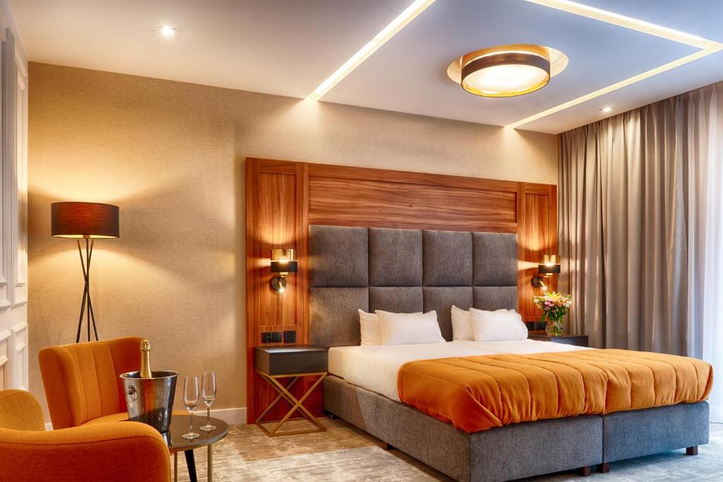 Posteľ alebo postele v izbe v ubytovaní Grand Focus Hotel Szczecin