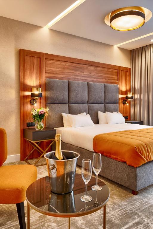 Posteľ alebo postele v izbe v ubytovaní Grand Focus Hotel Szczecin