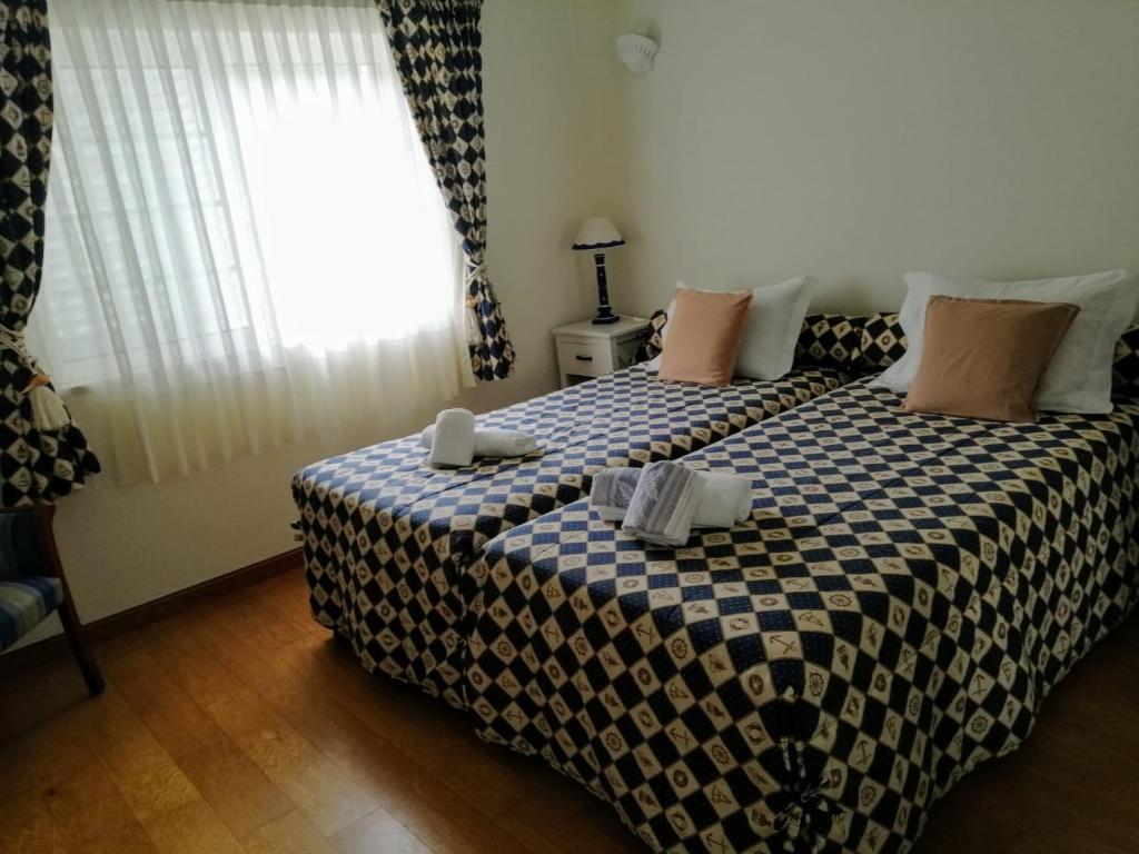 Postel nebo postele na pokoji v ubytování Casa Loureiro - Vista Rio Douro