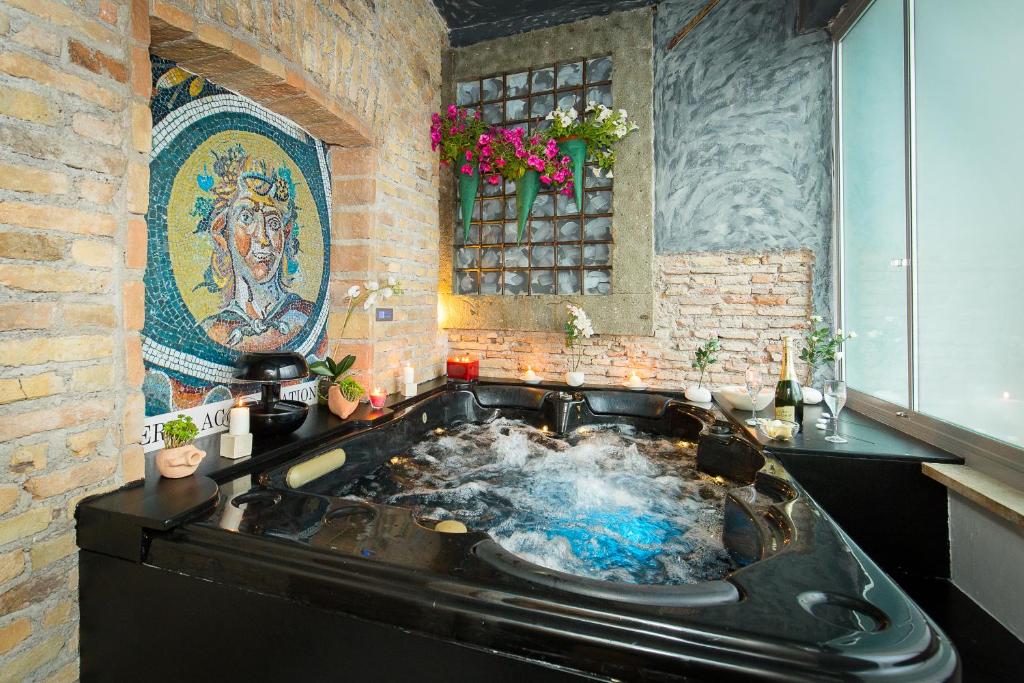 a kitchen with a bath tub with smoke in it at Nerva Accomodation Cavour in Rome