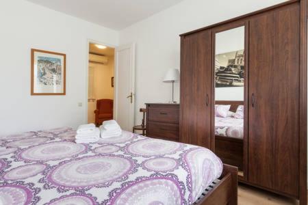 A bed or beds in a room at Piso Zona Plaza España, junto a Montjuic,