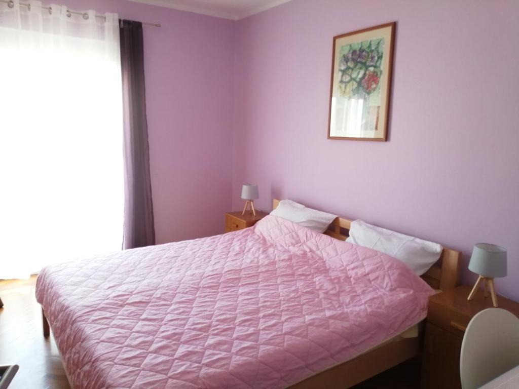 Postel nebo postele na pokoji v ubytování Apartment Maria