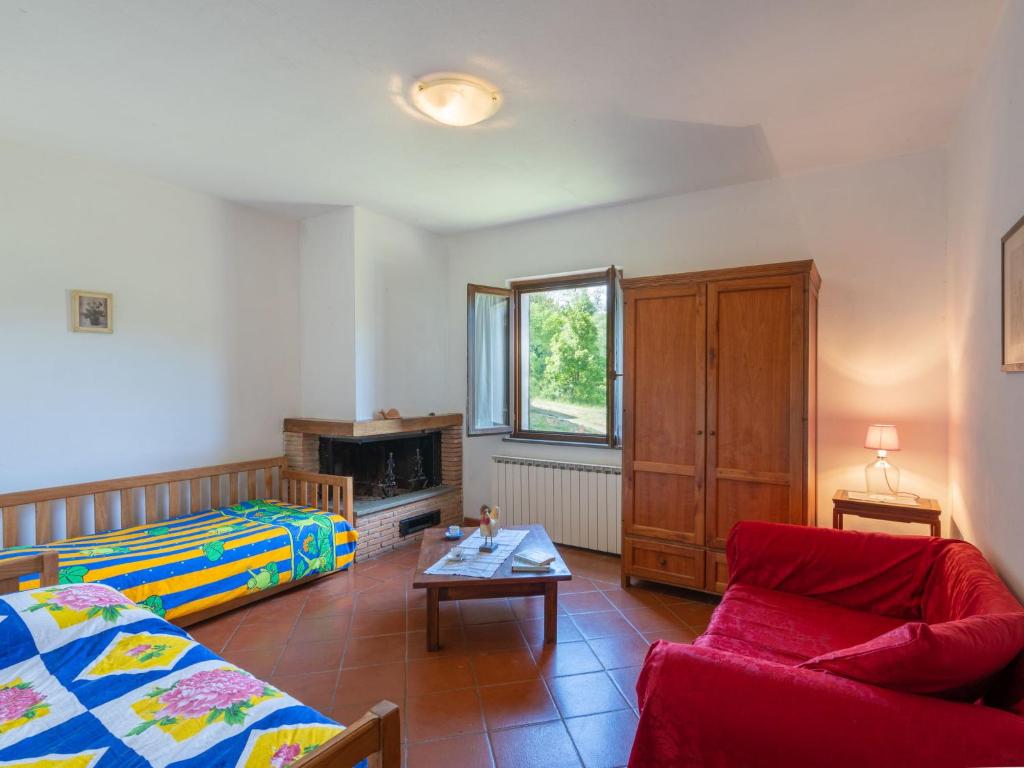 Postel nebo postele na pokoji v ubytování Holiday Home Podere Ritali by Interhome