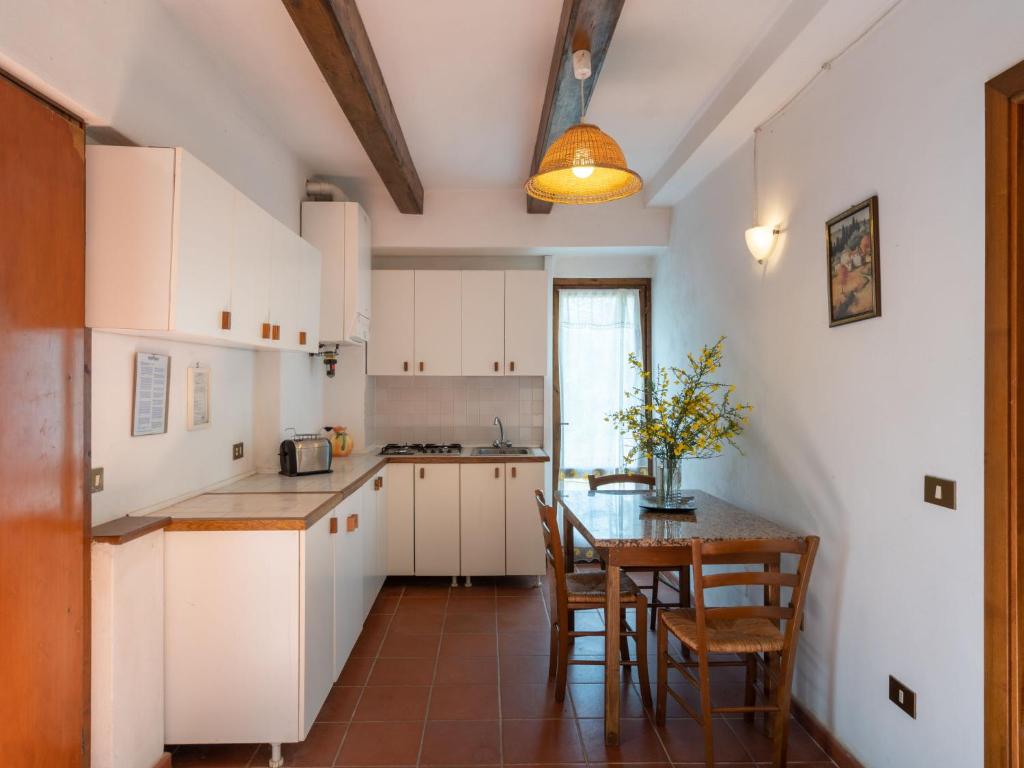 Kuchyň nebo kuchyňský kout v ubytování Holiday Home Podere Ritali by Interhome