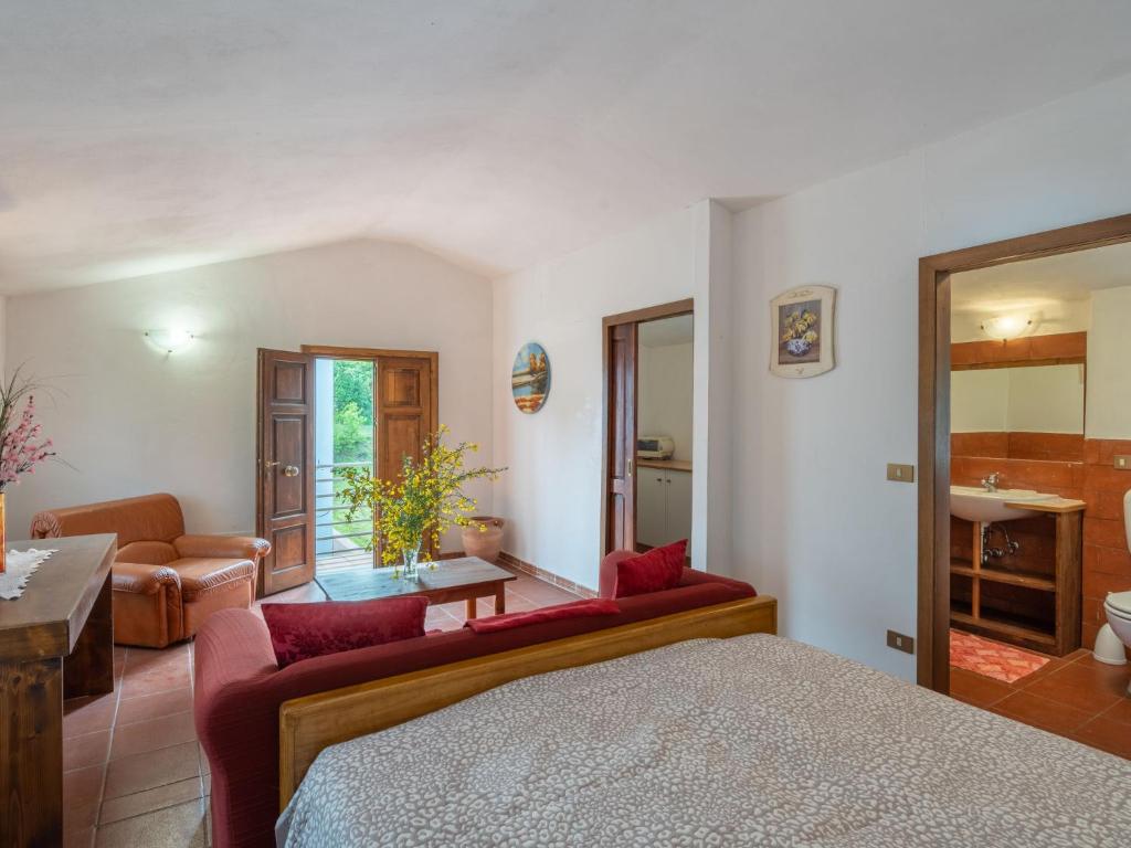 Postel nebo postele na pokoji v ubytování Holiday Home Podere Ritali by Interhome