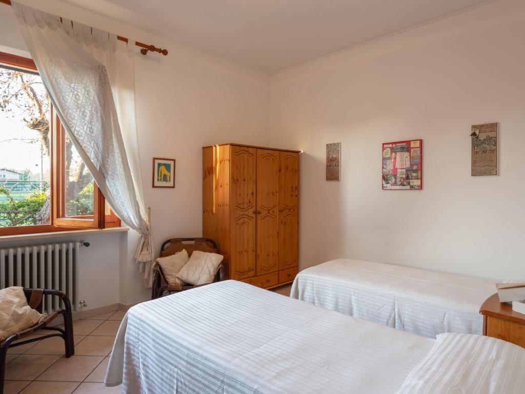 Posteľ alebo postele v izbe v ubytovaní Holiday Home Donatella by Interhome