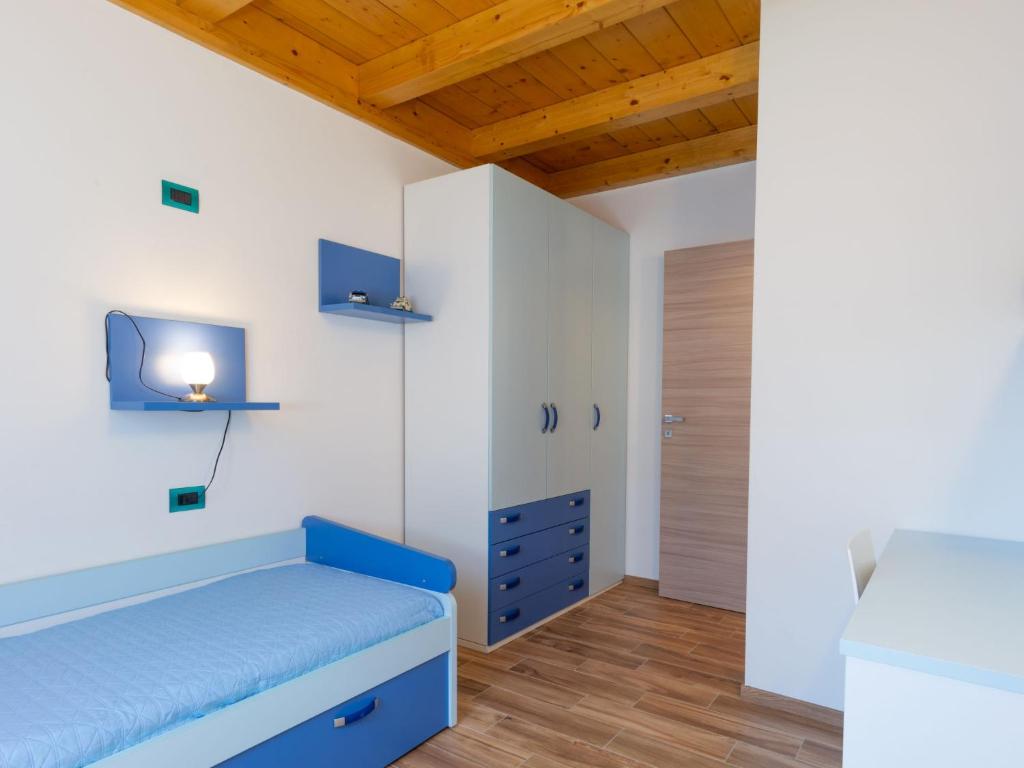 Łóżko lub łóżka w pokoju w obiekcie Holiday Home Gelsomini - CCO521 by Interhome