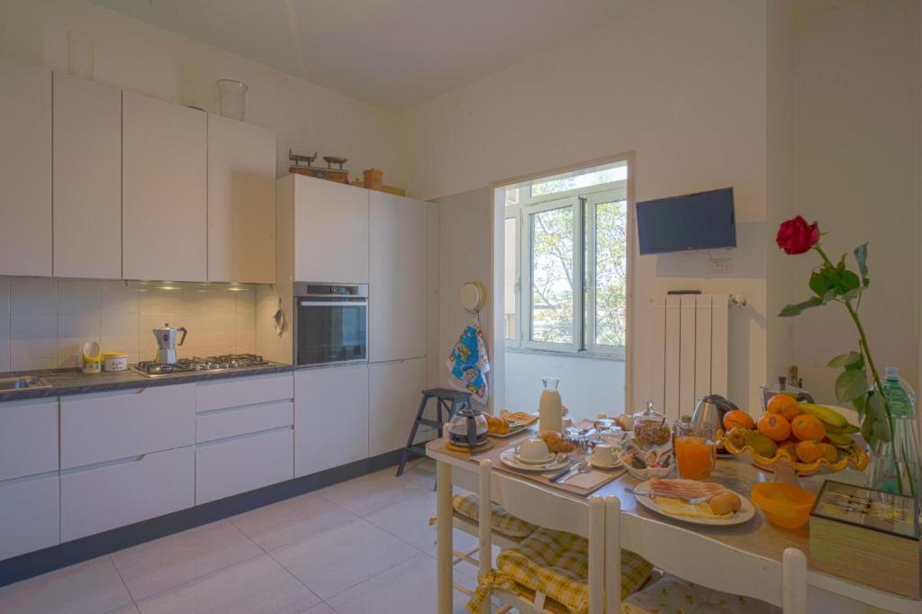 Kuchyň nebo kuchyňský kout v ubytování A Casa Da Mami