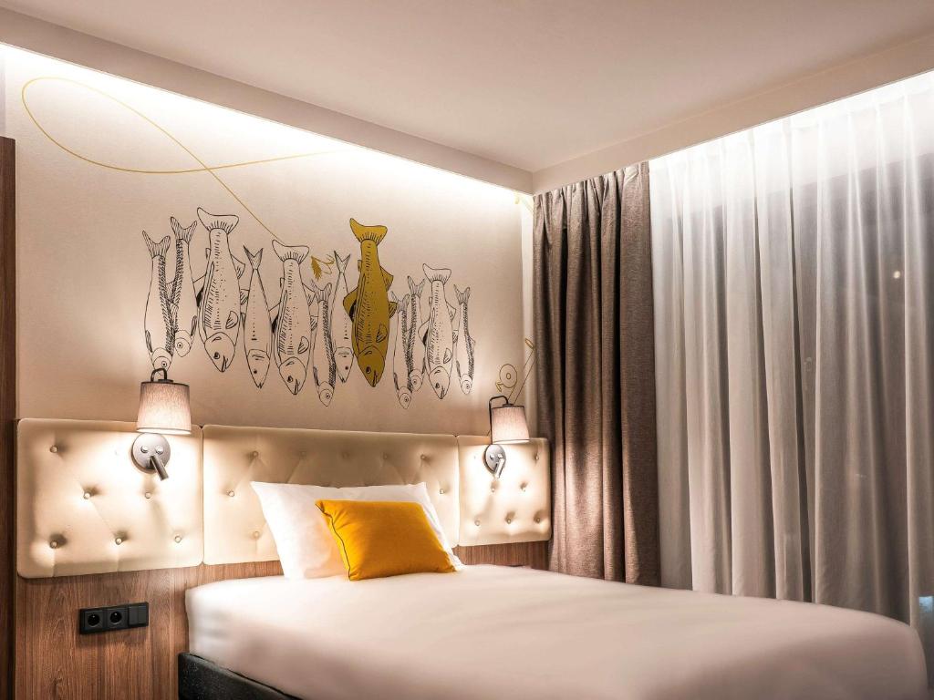 Posteľ alebo postele v izbe v ubytovaní ibis Styles Lublin Stare Miasto