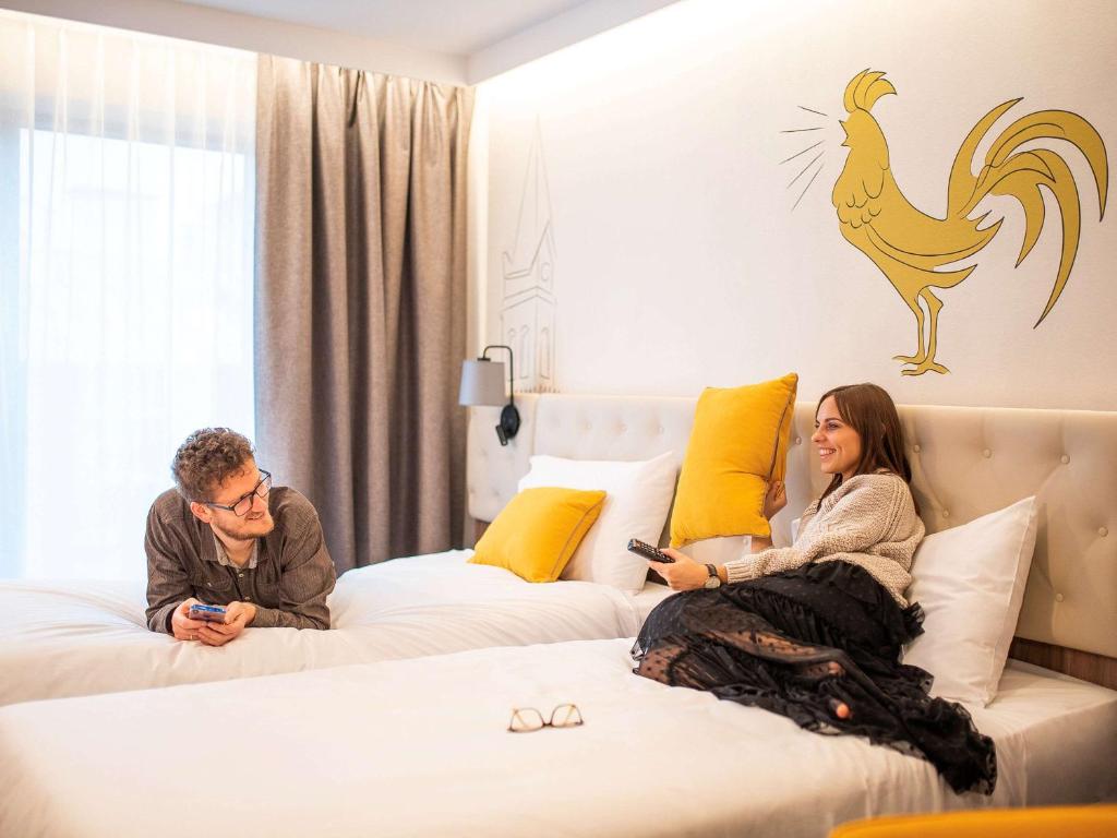 Posteľ alebo postele v izbe v ubytovaní ibis Styles Lublin Stare Miasto