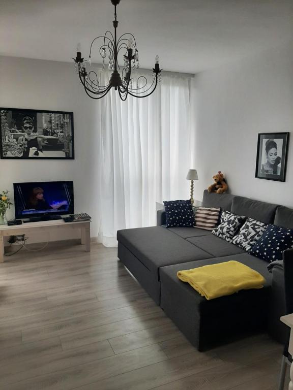 Гостиная зона в Hollywood Apartament Kosciuszki