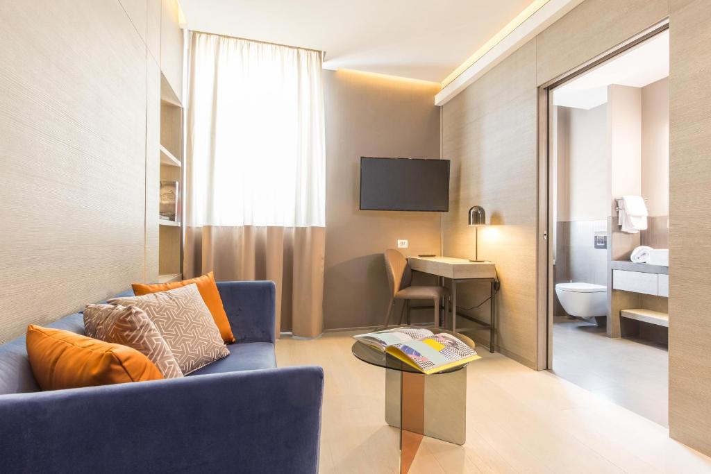 TV a/nebo společenská místnost v ubytování Orazio Palace Hotel