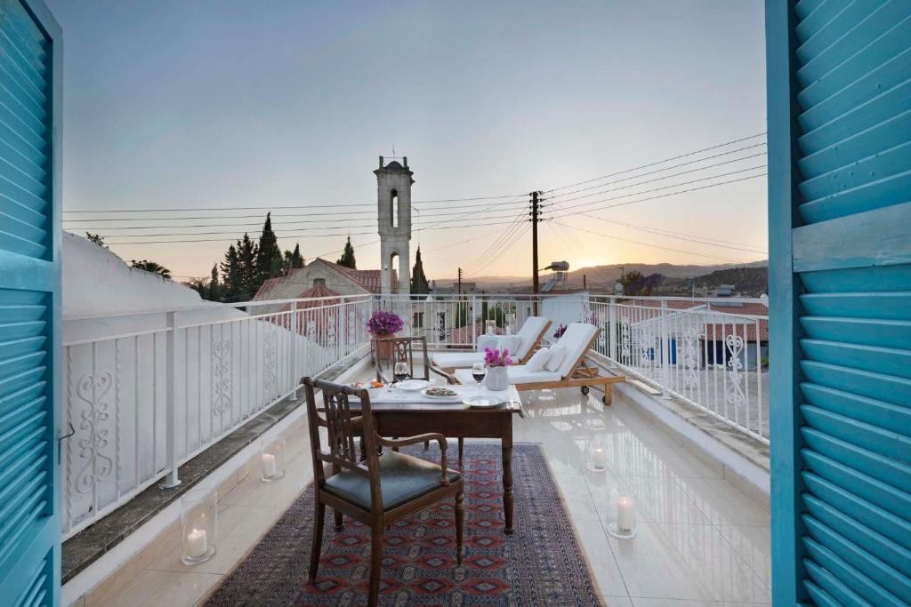 En balkon eller terrasse på Cottage Houses