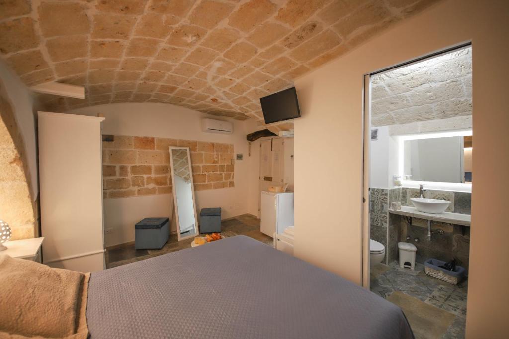 Televízia a/alebo spoločenská miestnosť v ubytovaní Terracielo Guest House