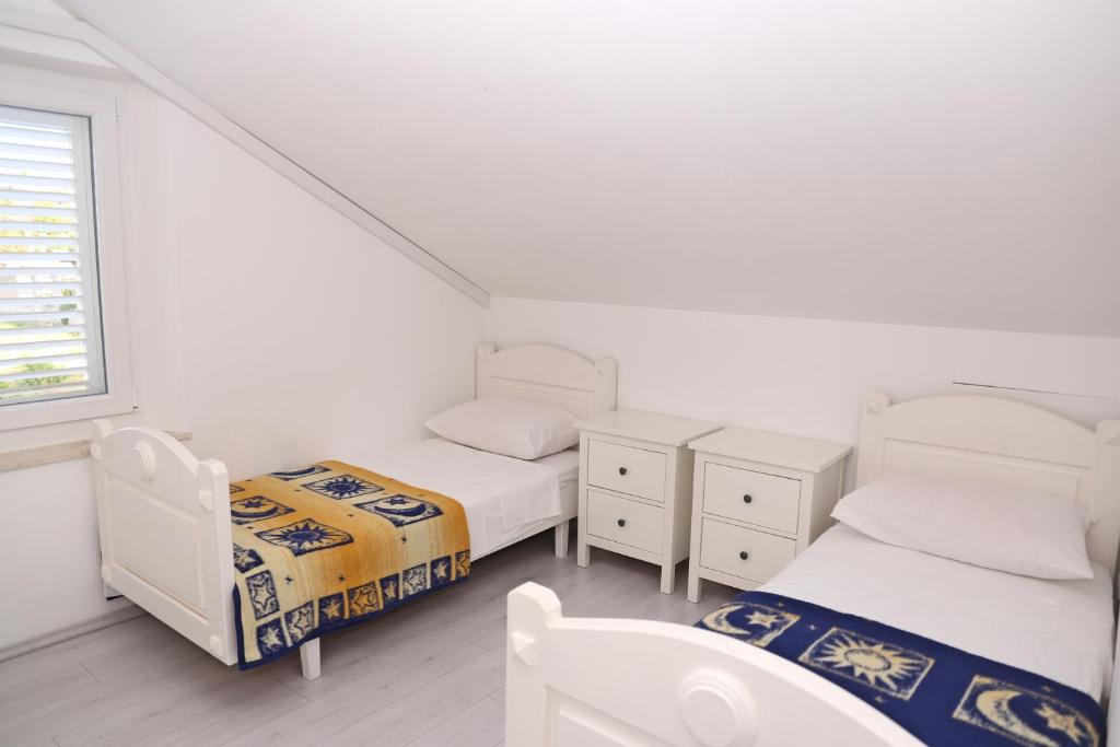 Postel nebo postele na pokoji v ubytování Pansion Marinka-Bire Rooms
