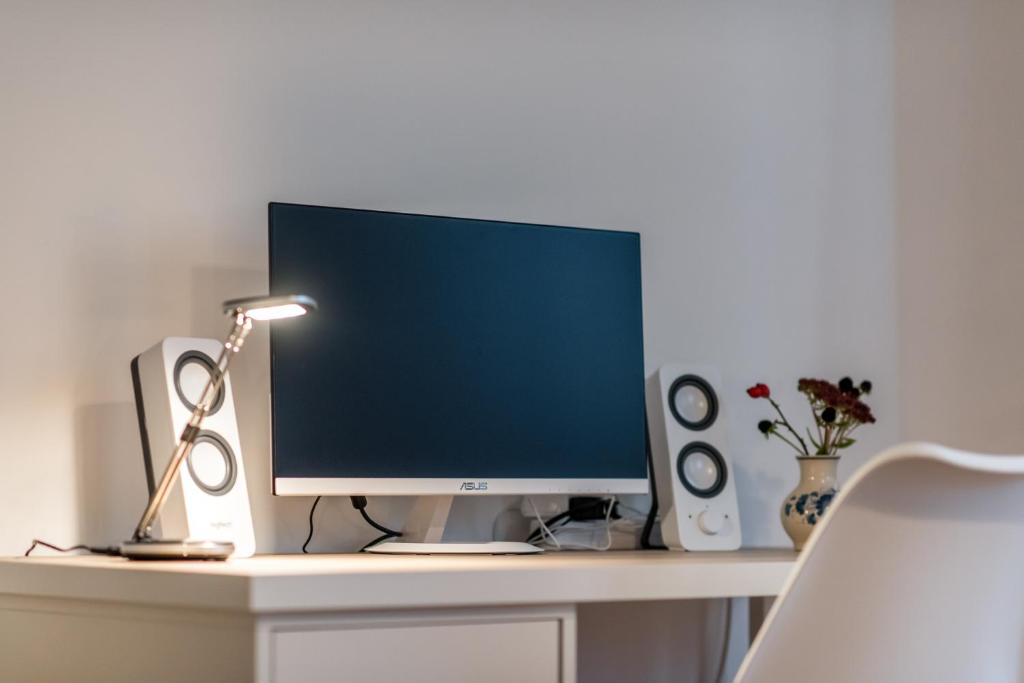 TV a/nebo společenská místnost v ubytování Apartment CHOPIN