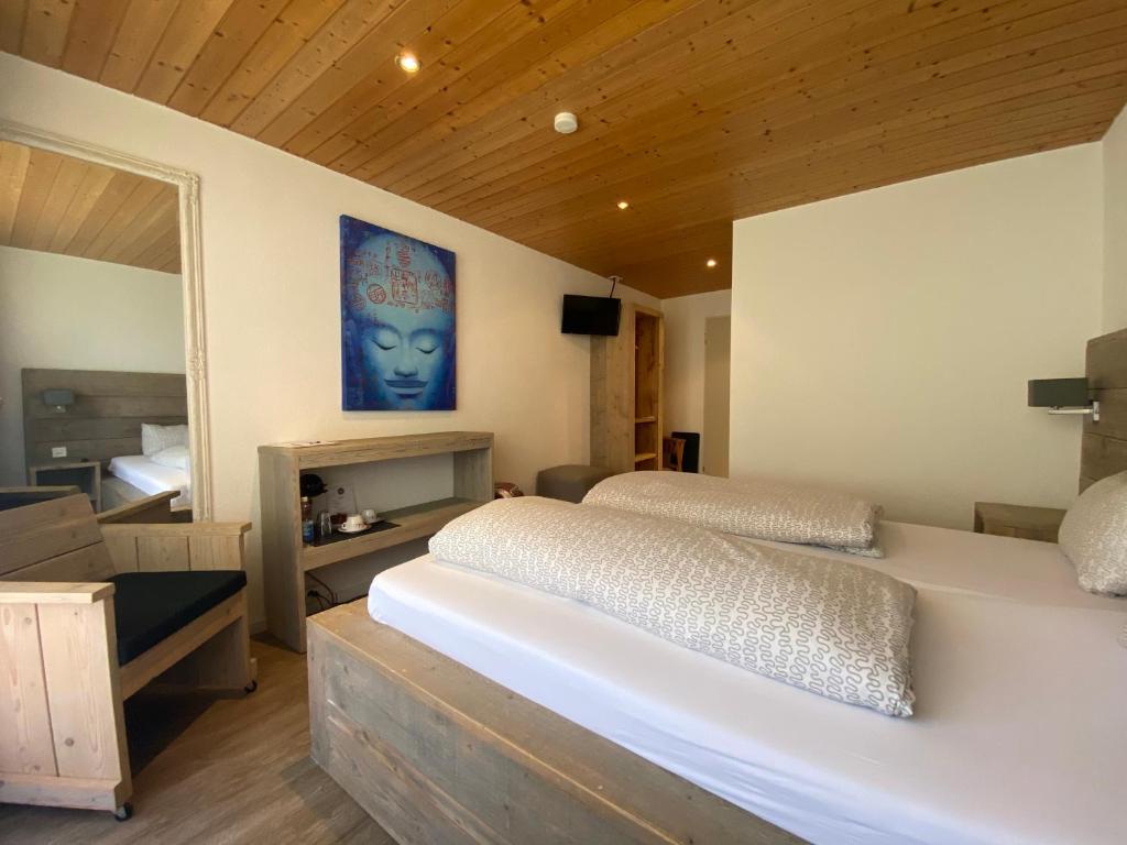 Postel nebo postele na pokoji v ubytování Hotel Twing