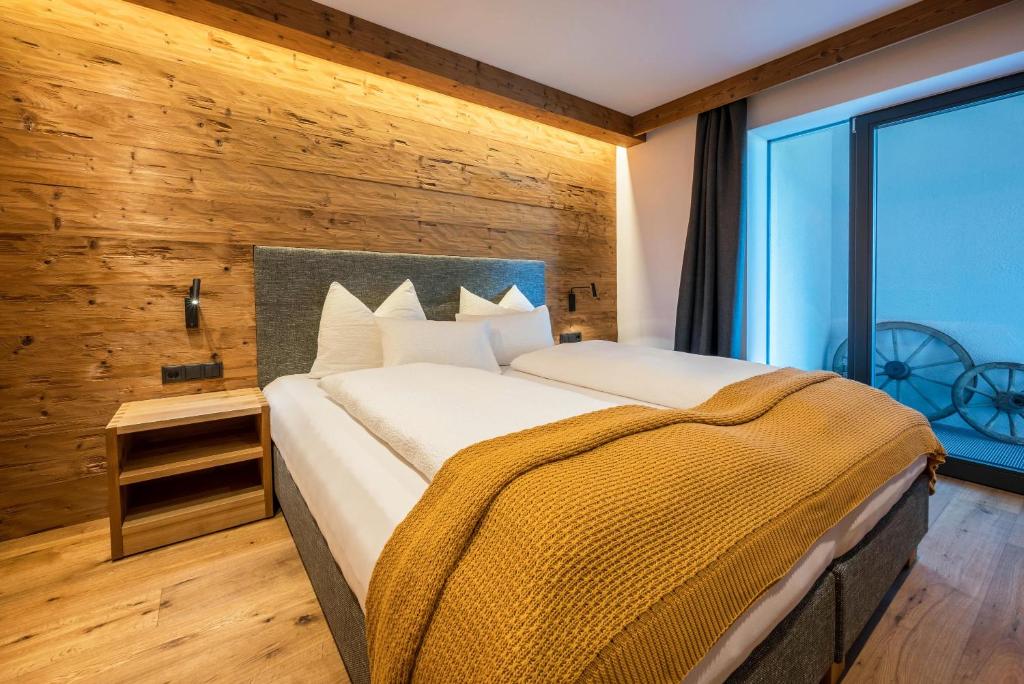 Postel nebo postele na pokoji v ubytování App Mulin Hilda mit Sauna