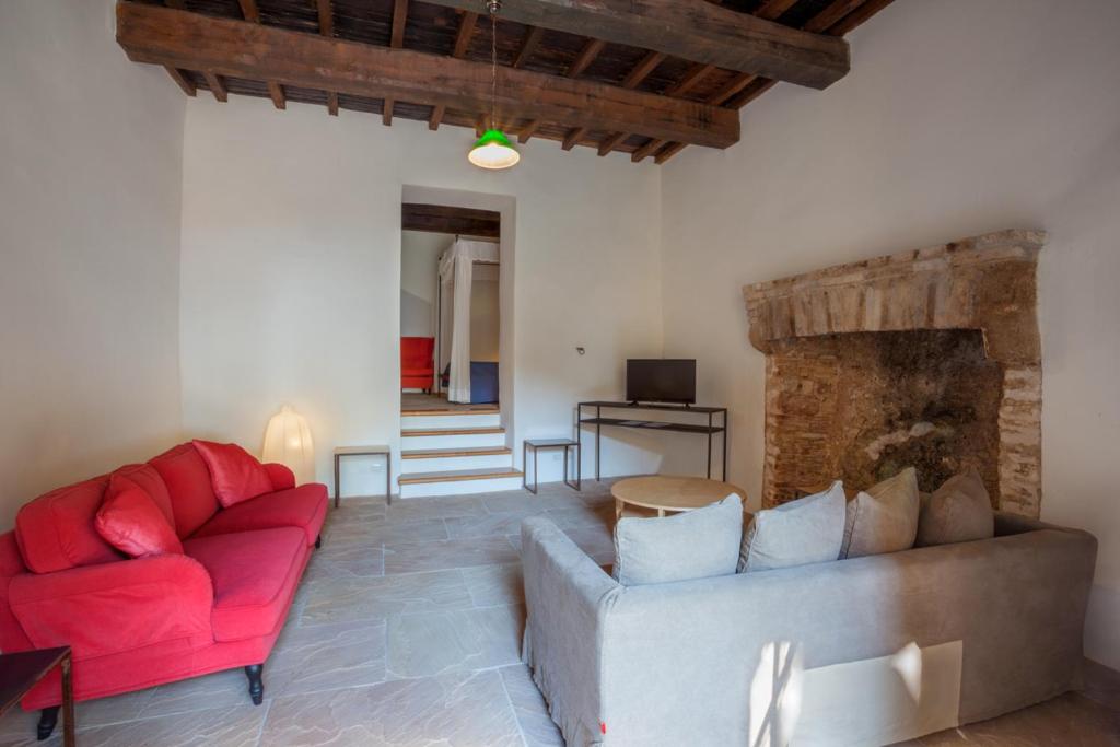 TV a/nebo společenská místnost v ubytování Il Castello di Campello