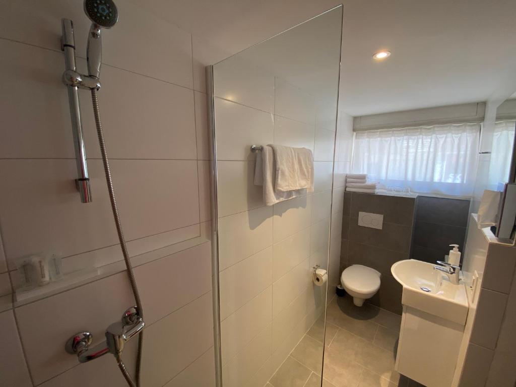 Koupelna v ubytování Hotel Twing
