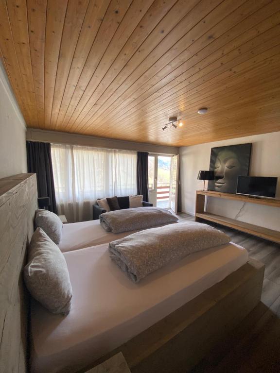 Postel nebo postele na pokoji v ubytování Hotel Twing