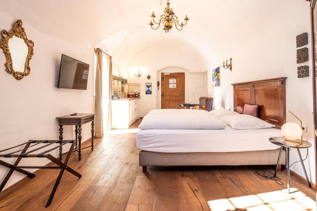 Posteľ alebo postele v izbe v ubytovaní Stammhaus - Premium Residences