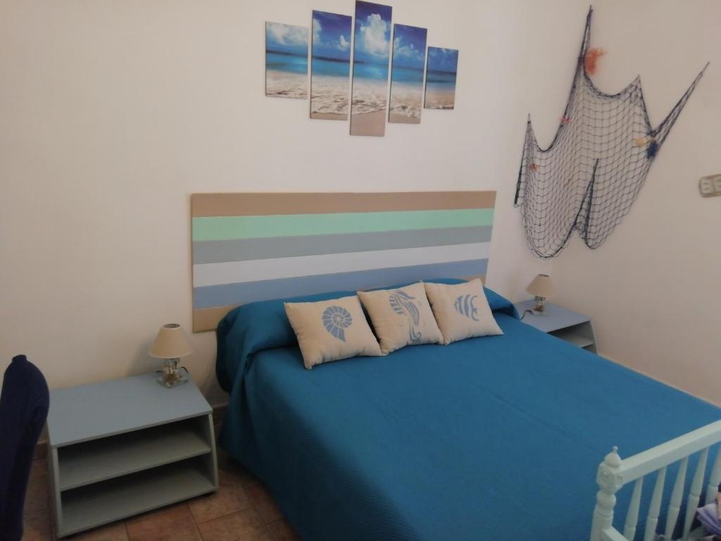 Posteľ alebo postele v izbe v ubytovaní Casa Allegra