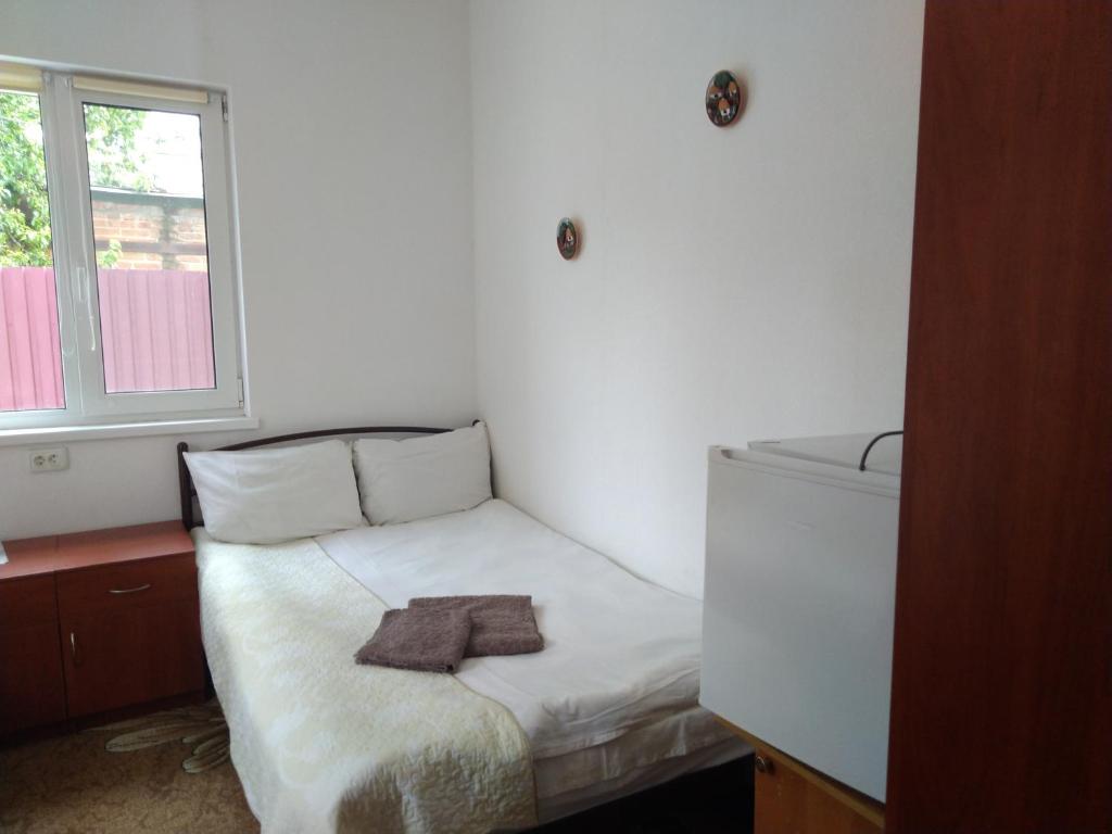 Postel nebo postele na pokoji v ubytování Kak v gostinice