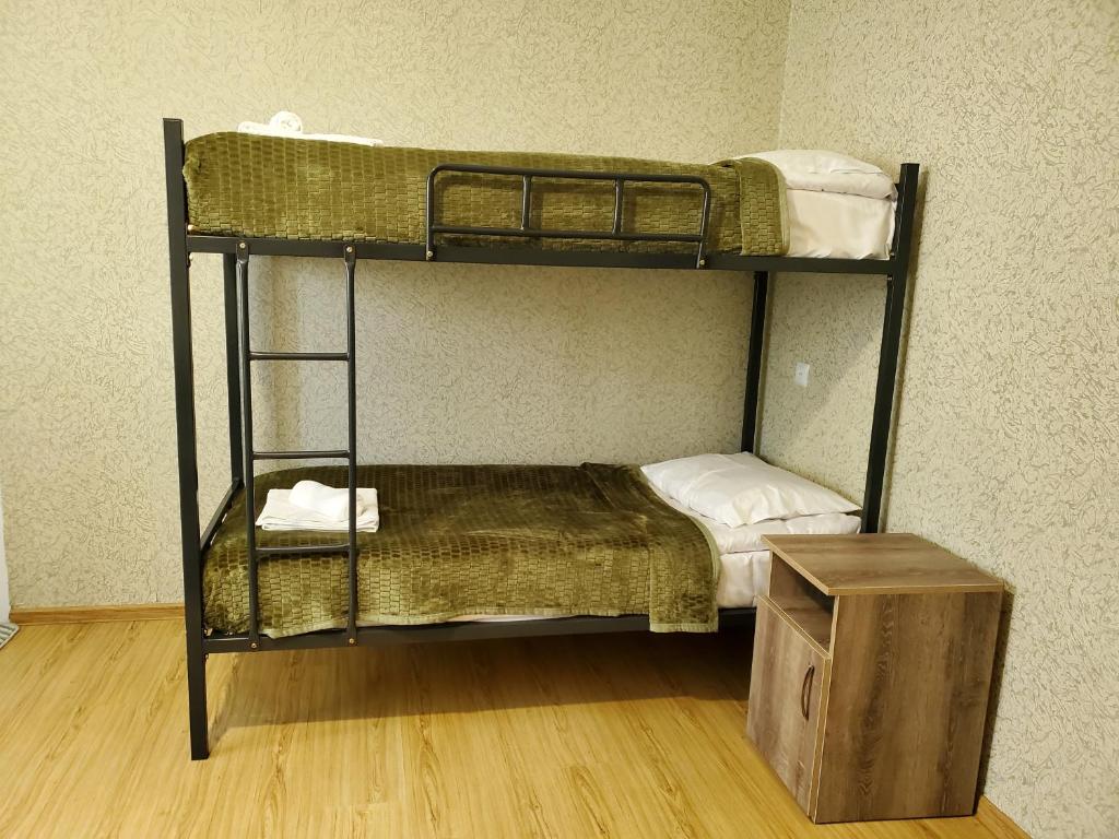 Palanda nebo palandy na pokoji v ubytování Beehives