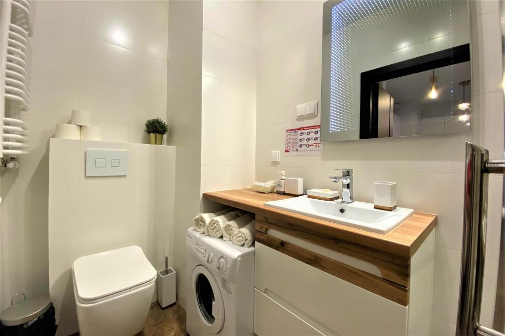 Kúpeľňa v ubytovaní erApartments Mennica Residence