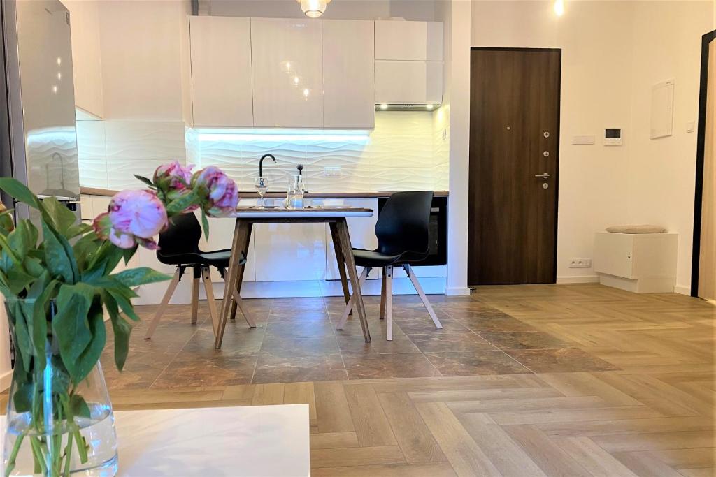Kuchyňa alebo kuchynka v ubytovaní erApartments Mennica Residence
