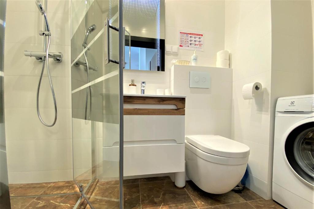 Kúpeľňa v ubytovaní erApartments Mennica Residence